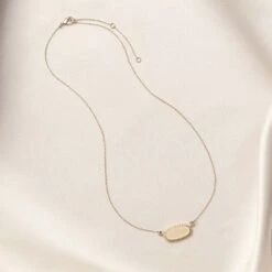 Presley Charm Necklace - Champagne 12 Presley Charm Necklace - Champagne -Elegance Bridal Store champagne presley charm necklace accessories 02